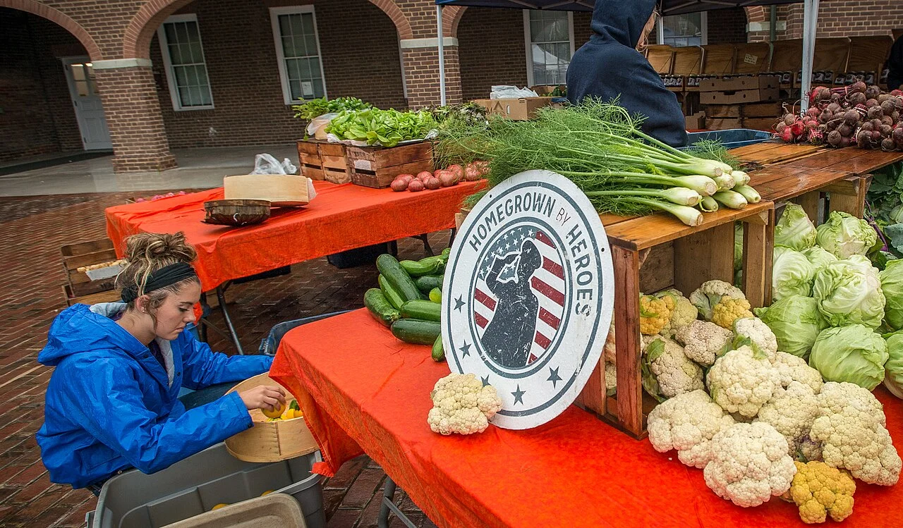 Preparing for a diesel shortage: a farmer's market stand with fresh local vegetables